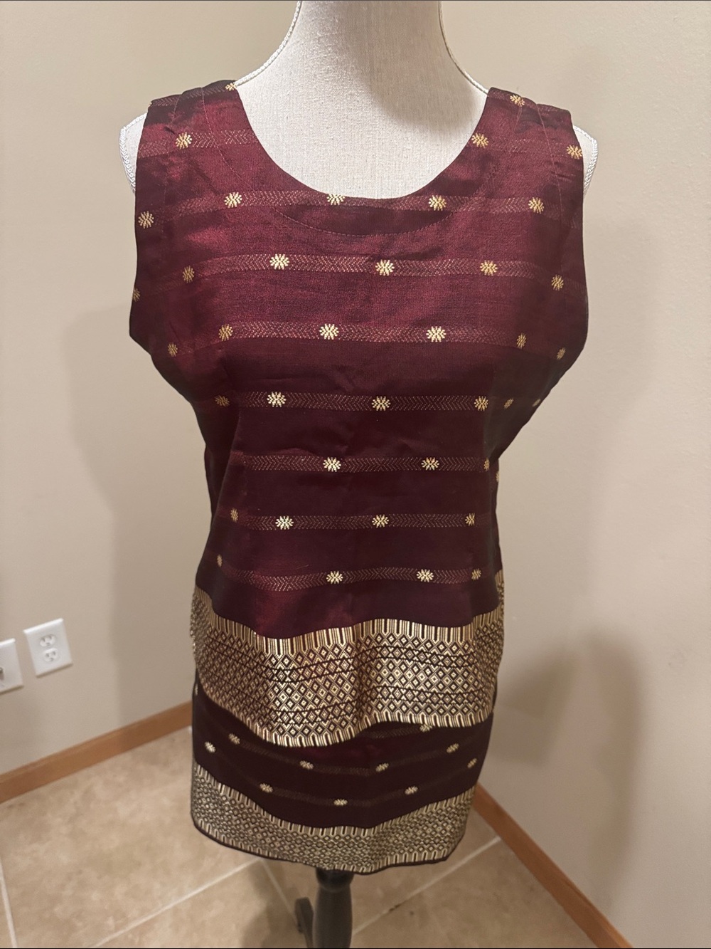 Sleeveless Silk Burgundy Tunic Top with Gold Accent and matching skirt